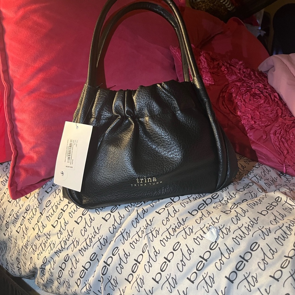 Trina Turk Black Leather Shoulder Bag with matching cosmetic bag…